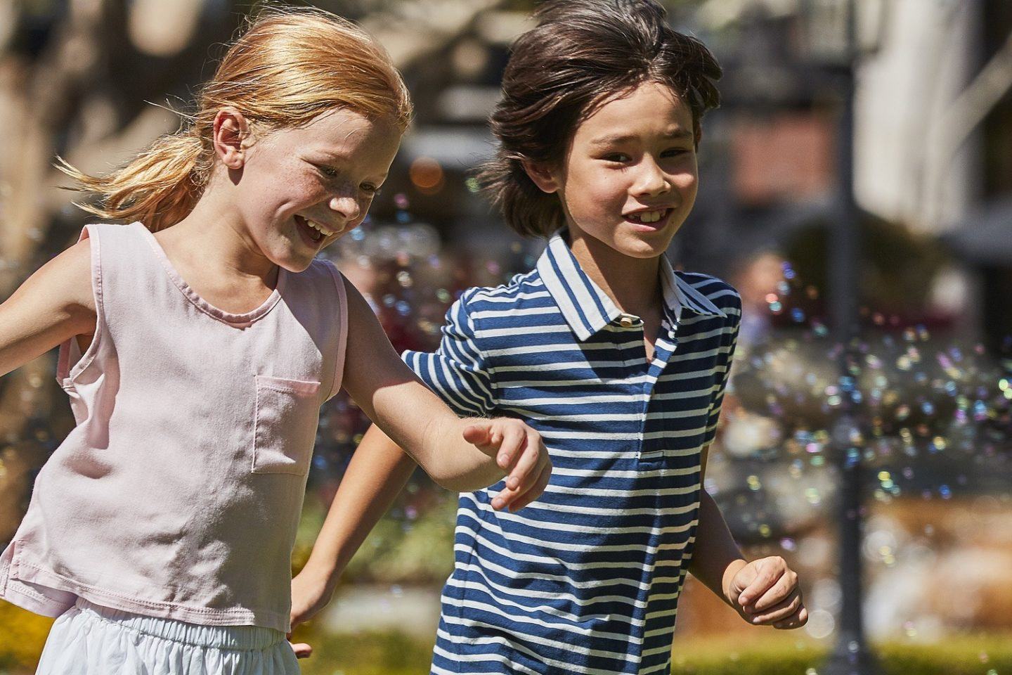 Two kids, a girl and a boy having fun